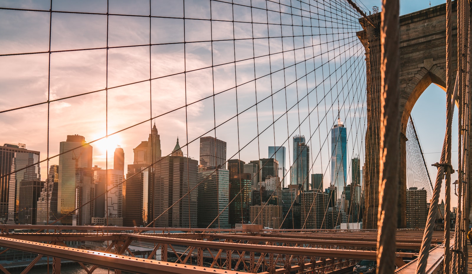 View of the Manhattan skyline at sunset from the Brooklyn Bridge, New York City